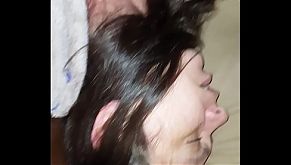 Whitening her teeth while she sleeps